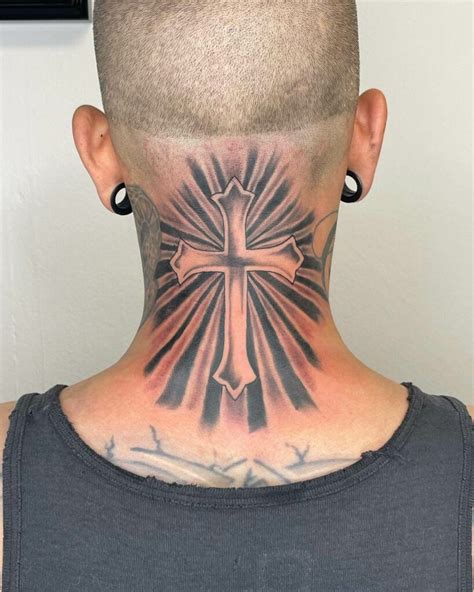 cross tattoo on the back of neck|neck cross tattoo meaning.